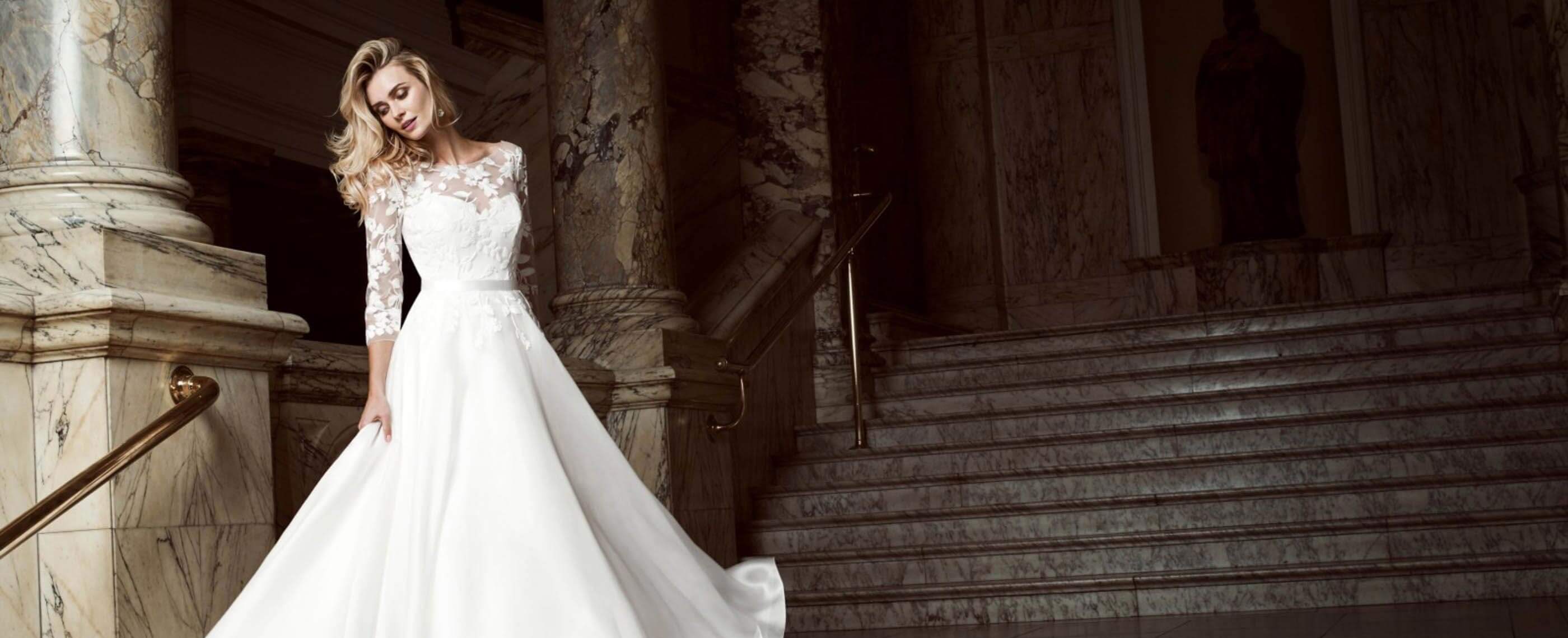 Model wearing a white gown