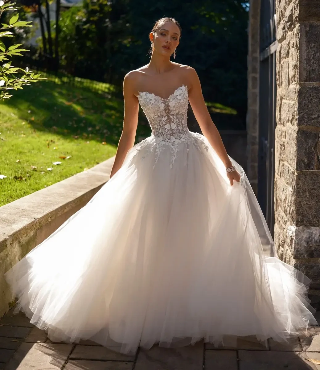 Model wearing a white gown