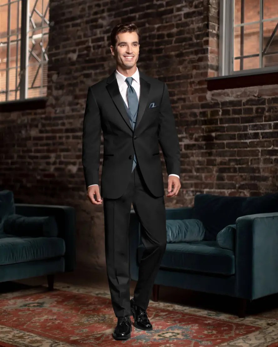 Model wearing a tuxedos suit